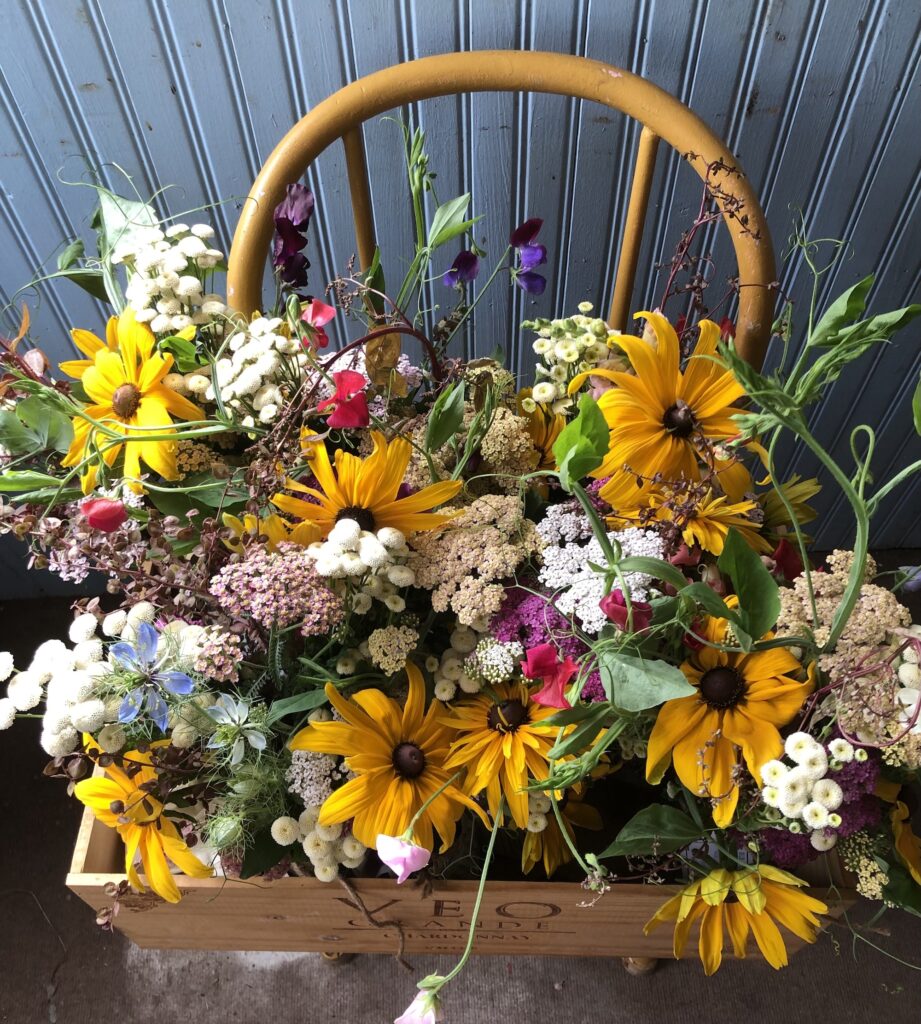 yellow chair with bouquets